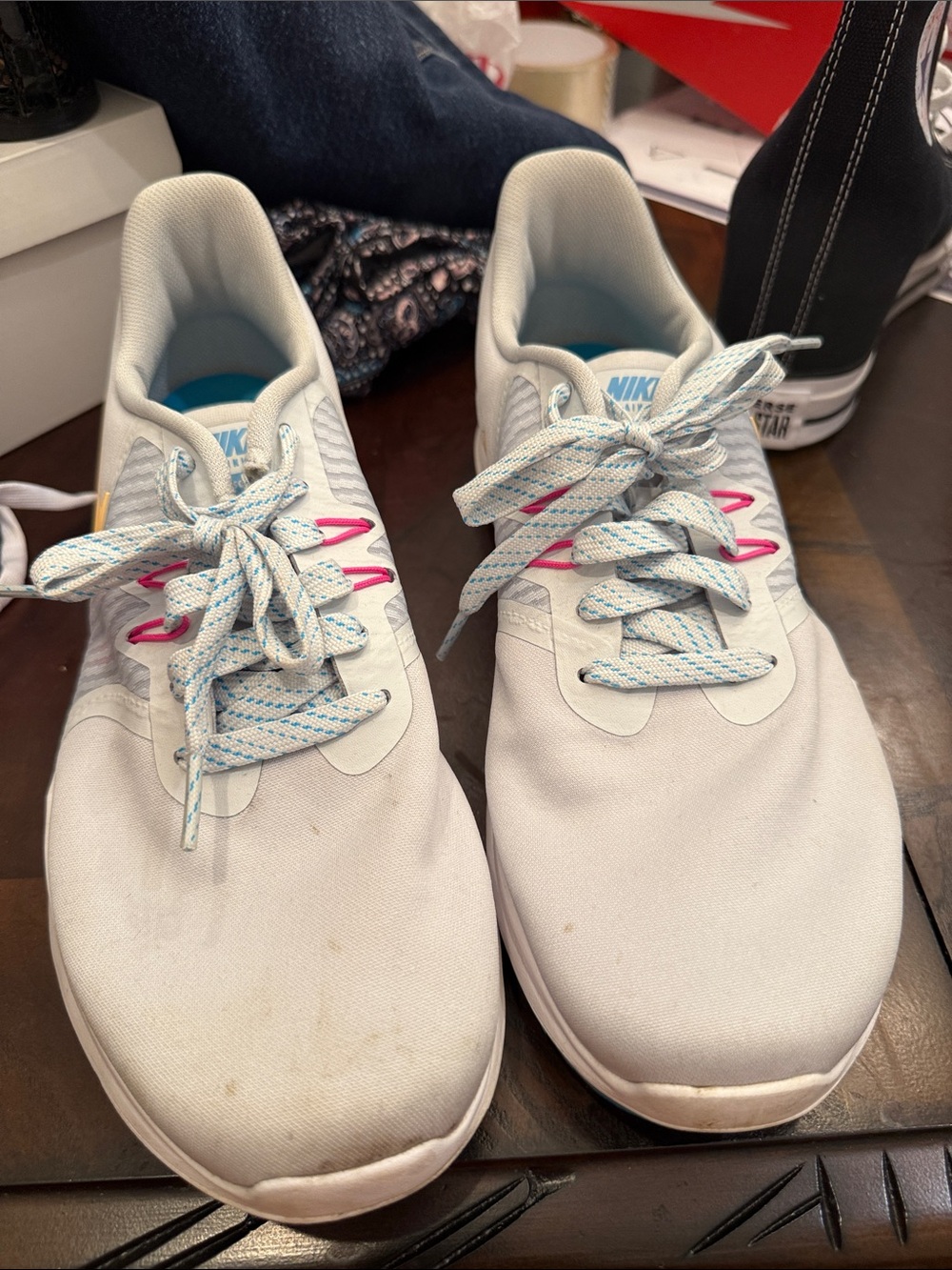 Nike White Sneakers with Pink Eyelet Accents and Light Blue Laces